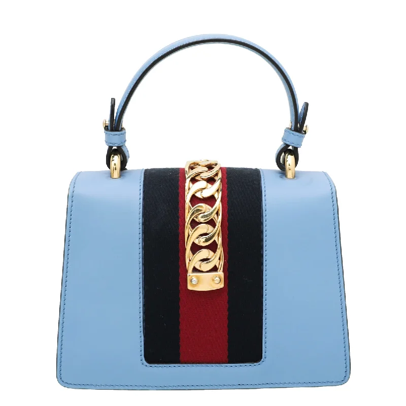 Ladies Gucci shoulder bags with a magnetic - closure flapGucci Blue Sylvie Top Handle Mini Bag