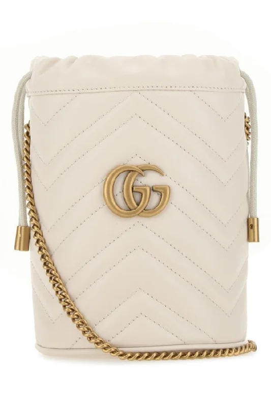 Women Gucci Sylvie bags with a detachable ribbon detailGucci Women Ivory Leather Marmont Bucket Bag