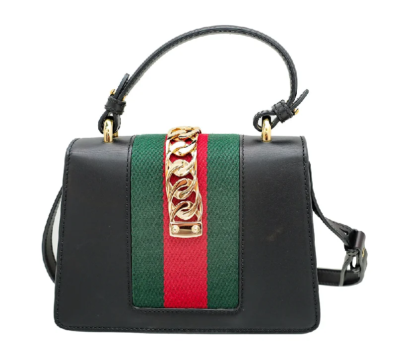 Ladies Gucci handbags with a detachable coin purse insideGucci Black Sylvie Top Handle Bag