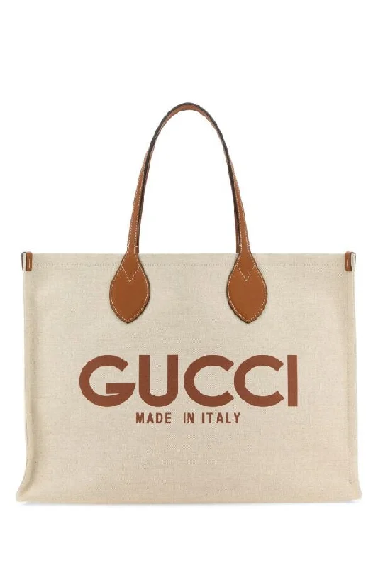 Gucci backpacks for women with a multi - pocket designGucci Women Sand Canvas Shopping Bag