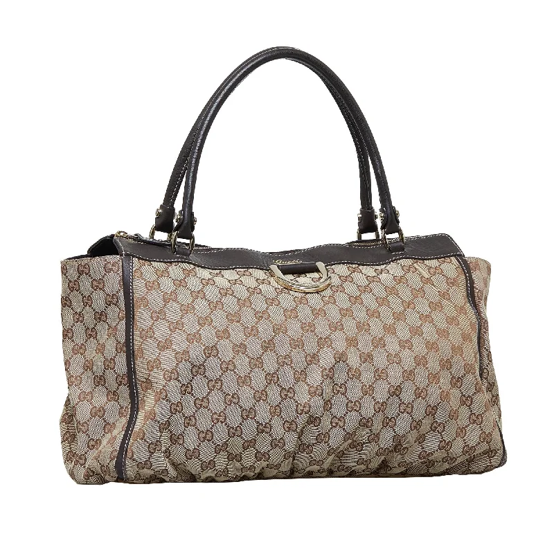 Women Gucci Sylvie bags with a crystal - embellished web stripeGucci GG Canvas Abbey D-Ring Tote (i0gmim)