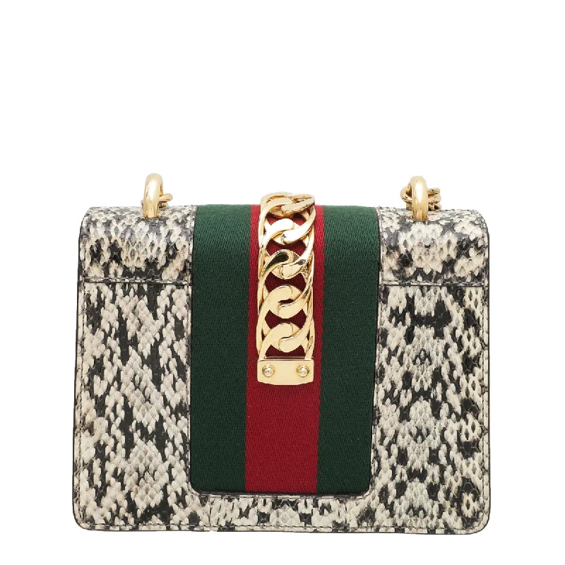 Women Gucci backpacks with a luxurious leather finishGucci Natural Snakeskin Sylvie Mini Chain Bag