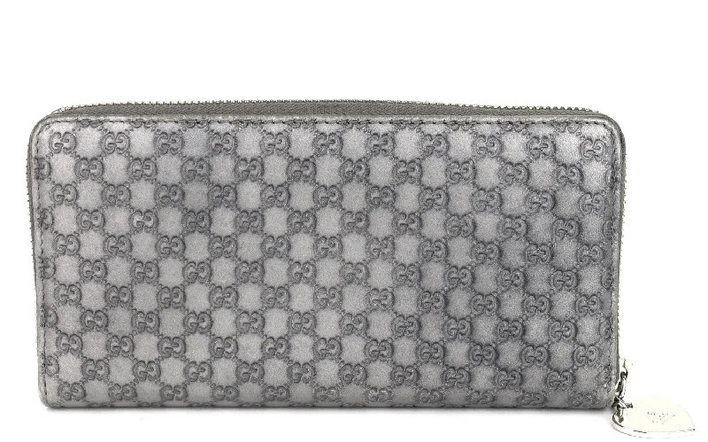 Women Gucci Sylvie bags with a detachable ribbon detailZip Around Microguccissima Leather Wallet