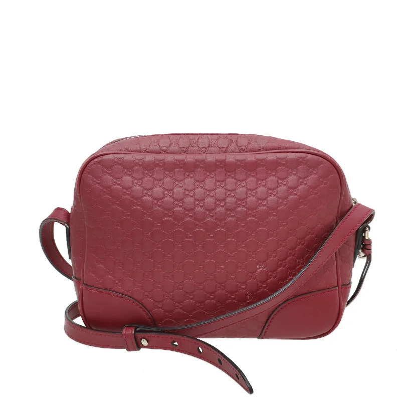 Women Gucci bags with a snap - button closure and a decorative charmGucci Red GG Microguccissima Bag