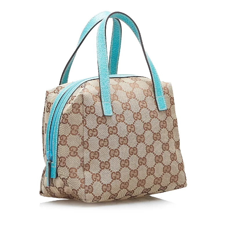 Gucci backpacks for women with a hidden back pocketGucci GG Canvas Handbag (SHG-kxif11)