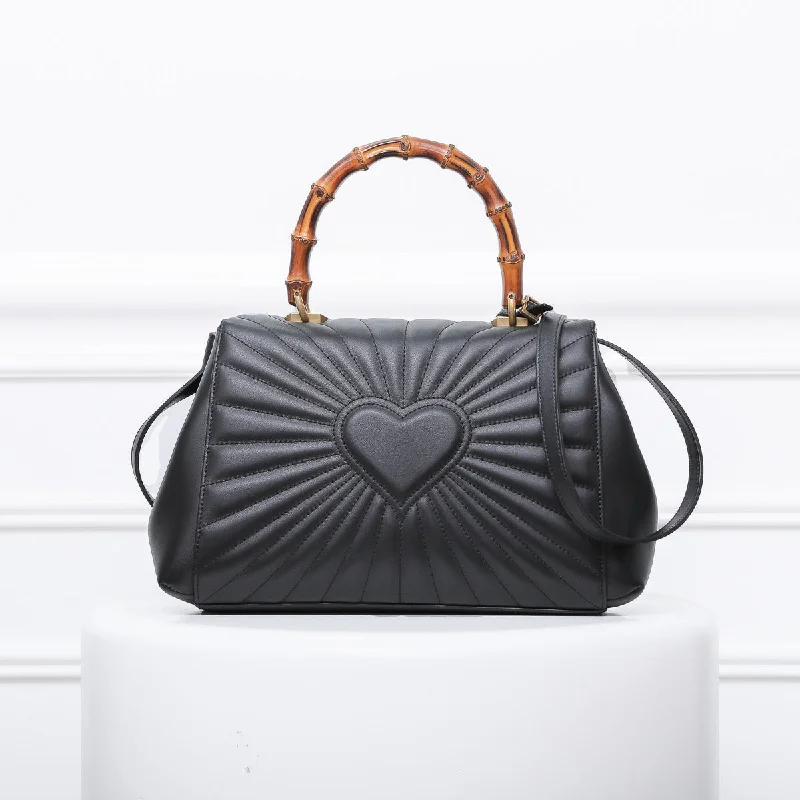 Gucci backpacks for women with a sleek silhouetteGucci Black Queen Margaret Bamboo