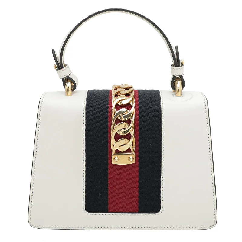 Gucci handbags for women with a metal - framed claspGucci White Sylvie Floral Embroidered Mini Bag